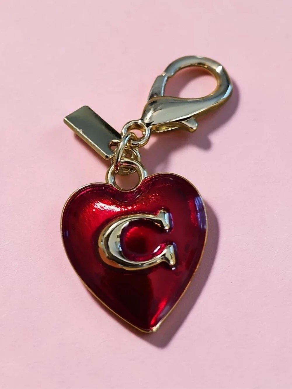 SASSIFIED  BOUTIQUE Nwt Gold Carriage Charm with Red Heart Tag